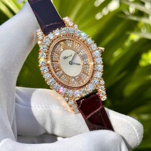 Đồng Hồ Chopard Nữ Dây Da Phủ Vàng Đính Đá Moissanite Mặt Elip 34mm (1)