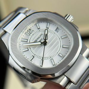 Đồng Hồ Patek Philippe Nautilus 7010 Chế Tác Mặt Trắng Máy Pin Thụy Sỹ 32mm (2)